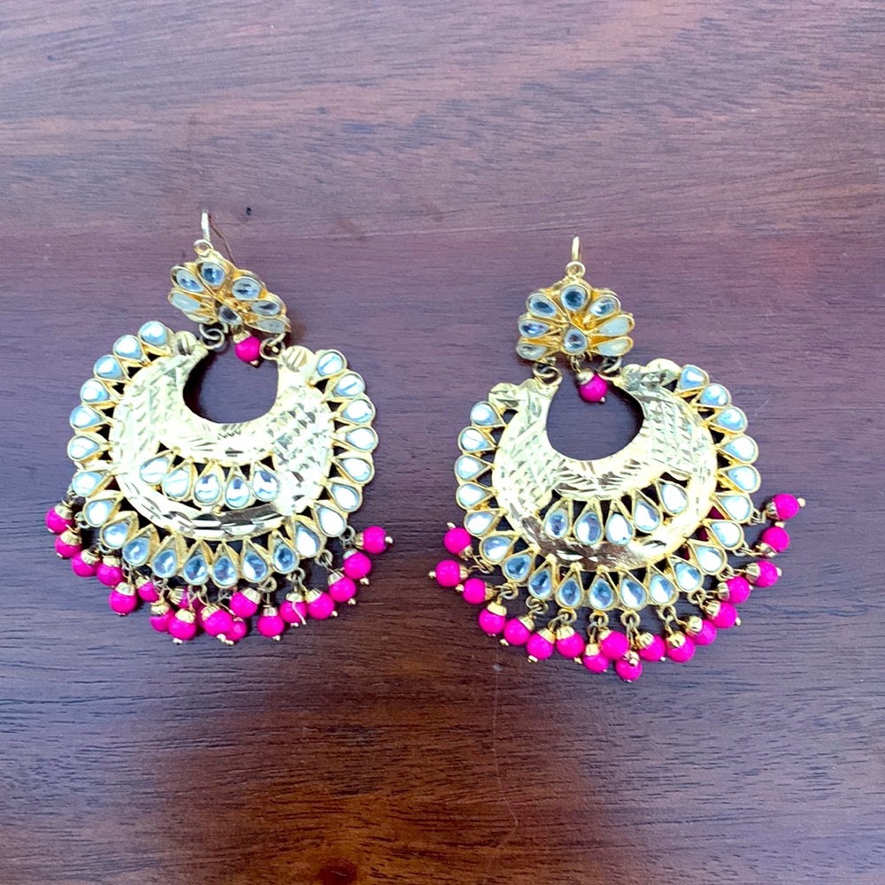 Khundan magenta earrings.